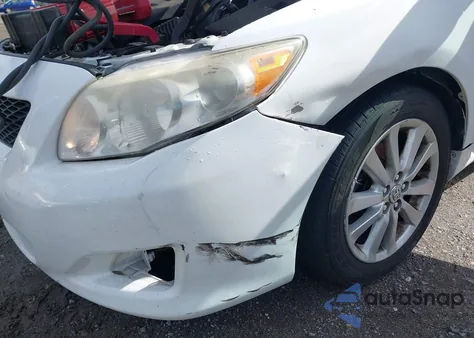 2009 Toyota Corolla Le z USA, uszkodzony, nr VIN JTDBL40E19J021756